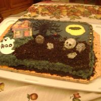 Halloween Cake My grandson gave me the idea for this cake. He wanted a graveyard with the skelton and hands coming out of the grave. The bad thing is I...