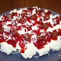Spagetti Cupcakes Ferrero Roche chcolates for the meatballs, strawberry jelly for the sauce. Chocolate cupcakes. Fun for a spagetti dinner at my church.