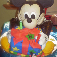 Mickey Mouse Cake With Present mickey mouse cake made with fondant and rice crispies