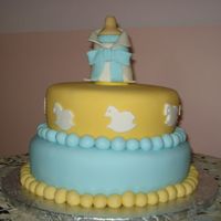 Boy Baby Shower Vanilla cake, buttercream and fondant finish. The topper was made in gumpaste.