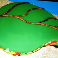 Leaf I used the medium paisley mold for this cake and carved it to get the leaf form. This is a simple chocolate cake, chocolate buttercream and...