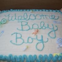 Baby Shower Cake For Boy! I made this cake for a baby shower for a boy. one of my first ones. I had to use the little party favors beacause at that time couldn'...