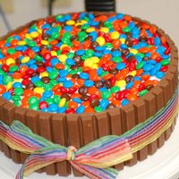 Candy Barrel Cake 10in Chocolate with orea buttercream fill and bc frost. Kit Kats and M&M's for the top. for my best friend's 30th Birthday at...