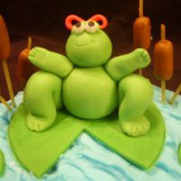 Girl Frog This is my first "model". My friend LOVES frogs, so i made this for her bday cake! just fondant.