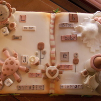 Baby Safari Cake inspired buy a baby bed set called "sleepy safari" thi scake was for a baby shower. All hand modelled and very simple