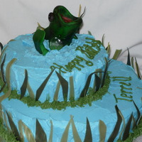 Bass Cake Buttercream icing with fondant accents. The fish is modeled out of fondant as well