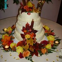 Autumn Wedding Cat tails, acorns, leaves and all but the flowers on the table are gum paste.