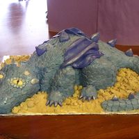 Blue Dragon This dragon is for my daughter's 3rd birthday (which is today, March 30th!!). The body is chocolate fudge cake with cream cheese...