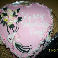 100_0270.jpg Made this for my family. Strawberry cake with strawberry buttercream. It was delicious!