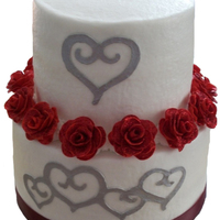 Red Rose Hearts This is a cake for a combined bridal shower for 3 diffrerent brides, so I went with the neutral love theme. Cake is iced with BC with a red...