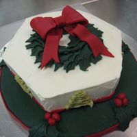 Christmas Cake Lemon chiffon cake with blueberry mousse filling. Covered in buttercream.