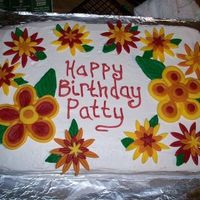 Fondant Flower Birthday Cake This cake also had a bottom border the same color as the writing.
