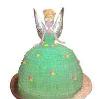 Tinkerbell Sorry the pic looks kind of weird. I forgot to take pics with my backdrop before delivery so my friend had to crop the picture. This was...