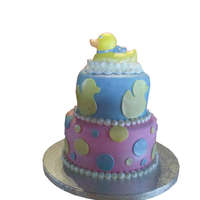 Rubber Ducky Sorry the pic looks kind of weird. I forgot to take pics with my backdrop before delivery so my friend had to crop the picture. This cake...