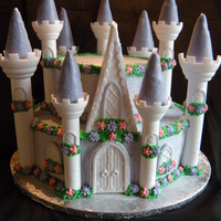 Castle Cake This is my 3rd castle cake I've made and it's the largest! 6 layer 12" round on the bottom and 6 layer 8" round on the...
