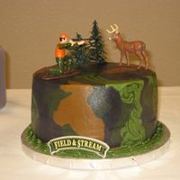 Groom's Camo Cake This is the Groom's cake that goes with the wedding cake I just uploaded. All butter cream with plastic figures. 8" chocolate.