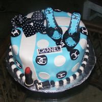 A Chanel Cake This is my first attempt at making gumpaste shoes. I printed off the template from here. They turned out ok, but i need more practice.