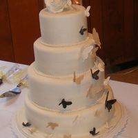 A Butterfly Cake This is a reproduction of a cake here on cakecentral. It's no way as good as the one on here, but it was my very first wedding cake! I...