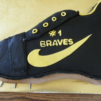 Track Banquet Shoe was made for a girls track banquet. Totally frosted with bc and used fondant accents. TFL