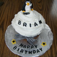 Go Pen-Guins! Named after a joke played on my hubby. Cupcake pan...buttercream icing with fondant accents. Go Pens! TFL :-)