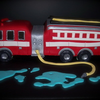 Another Firetruck All edible except for the flashing led light on top.