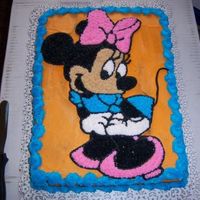 Cake5.jpg Minnie mouse cake....all BC. I got the template online