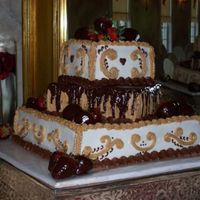 Gilmorewedding_Small.jpg I do not know the original poster of this cake. My client saw it here and copied the pic. I searched for the cake and could not find it to...