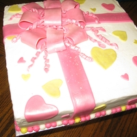 Square Pink Bow Gift Covered in uttercream with fondant accents. For a bridal shower - I was told pink and given one of the napkins used for the shower. I came...
