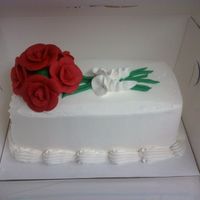 Roses The roses are made of royal icing, the frosting is pastry pride