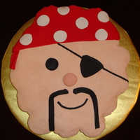 Pirate Cupcake Cake Vanilla cupcakes covered in buttercream with fondant accent. This was my first cupcake cake. TFL!