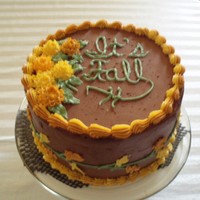 It's Fall I love Fall and Mums so to celebrate my favorite season, I made a cake with mums. Plus, I need to practice writing. This is a chocolate...