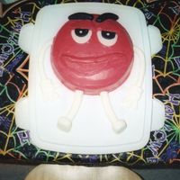 Red M&m Character This is a father's day cake since my dad is a huge fan of the M&M guys. He love's the commercials. The cake is iced in...