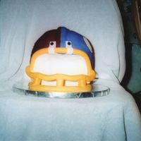Redskins & Vikings This was the second helmet I sculpted. Pound cake with fondant icing. The redskins on one side and the vikings on the other.