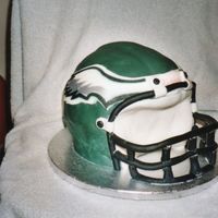 Eagle's Helmet This was the very 1st cake I ever sculpted. It was pound cake covered in fondant which I was not good at yet but it turned out ok. It was...