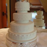 V1.jpg Wedding cake from Martha Stewart's Wedding Cake Book. It took a VERY long time, way longer than I could have imagined. Double layers...