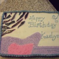 Hannah Montana Inspired Cake I got parts of the design from other cakes on cake central. The cake is white. Frosting is buttercreme. The "zebra stripes" are...