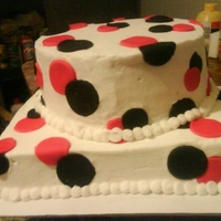 Polka Dot This was a cake done for a customer who's colors were black and red.. They loved it.. Thanks for looking.