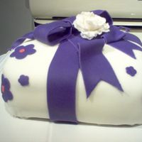 First Time With Fondant This is the first cake I've ever covered in fondant (without any help,anyway) and I'm really proud of it.