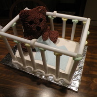 Baby Bear In Crib My variation on Wilton's Off to Dreamland. I did the bear in rice krispies instead of cake to make it lighter.