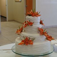 Calla Lilly Wedding Cake This is my first wedding cake, it is a vanilla cake covered in Fondant. There are 50 hand made gumpaste Calla Lillies that were formed then...
