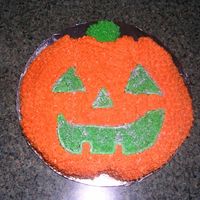 Pumpkin This was just an experiment. I carved the cake out of a 8" round and use the center of a cupcake for the stem. I used luster dust to...