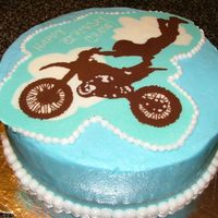 Motocross Cake White cake covered in butter cream. The motor cycle is a chocolate transfer. This was by far the most detailed chocolate transfer I have...