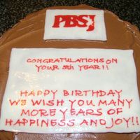 Mel's 5Th Anniversary And Birthday This was for one of my hubby's co-workers. The logo is from his business card and the writing as well as the logo are chocolate...