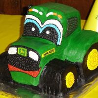John Deere Tractor This was for my nephew's first birthday. Completely hand carved, covered in buttercream. First time ever attempting this.