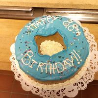 Donut Cake I made this for my friends grandfather who was turning 88, and he loves eating donuts : )
