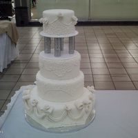 My Version Of The Masterpiece Wedding Cake From Wilton I made this cake for bridal show at the mall. It's a cake dummy with fondant and fondant flowers. The piping took me a week and I...
