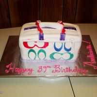 Coach Purse Cake This was my first coach purse, not my best. Its a butter cake with Indy Debi's Buttercream and MMF.