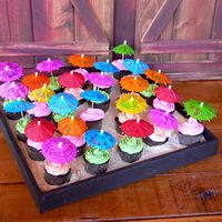 Luau Cupcakes These were cupcakes I made for a Luau party. I processed Vanilla Wafers in the food processor for the "sand" and set the cupcakes...