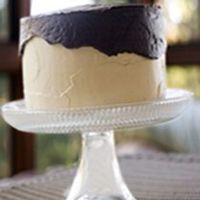 Peanut Butter Chocolate Cake This is a chocolate cake with peanut butter buttercream and a poured ganache topping. It was DELICIOUS!!!