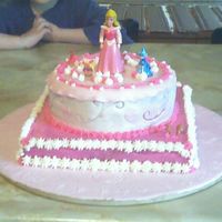 Sleeping Beauty Princess Birthday Cake This is a cake created for our oldest daughters birthday. She wanted a sleeping beauty cake. Hte figurine is purchased in the toy...